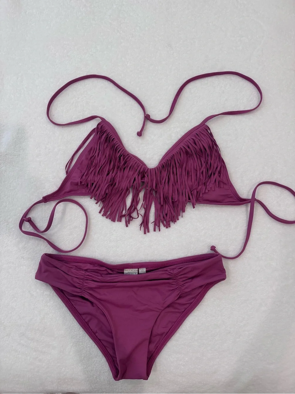 Preowned lspace bikini fringe top sz small and bottom sz medium